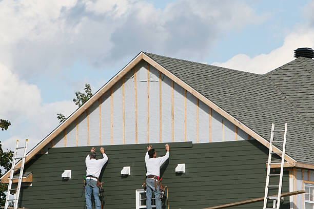Professional Siding Installation technician working in Keswick, VA